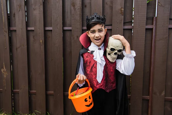 Happy Asian Boy Vampire Costume Holding Skull Trick Treat Bucket — Stock Photo, Image