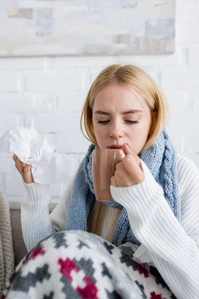 Diseased Blonde Woman Scarf Holding Cup Tea Tissue Living Room — Stock Photo, Image