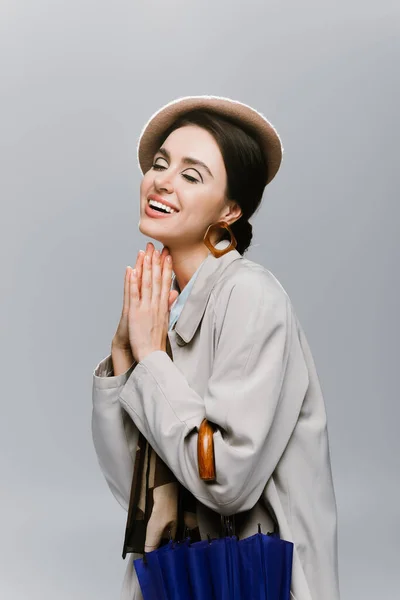 Cheerful Young Woman Beret Trench Coat Posing Blue Umbrella Isolated — Stock Photo, Image