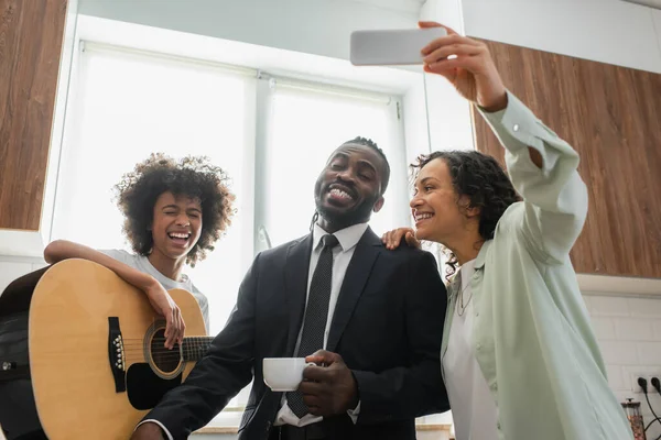 Happy African American Woman Taking Selfie Husband Suit Preteen Daughter — Stock Photo, Image