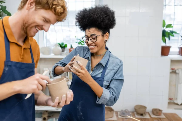 Cheerful African American Woman Eyeglasses Molding Clay Cup Happy Redhead — Stock Photo, Image