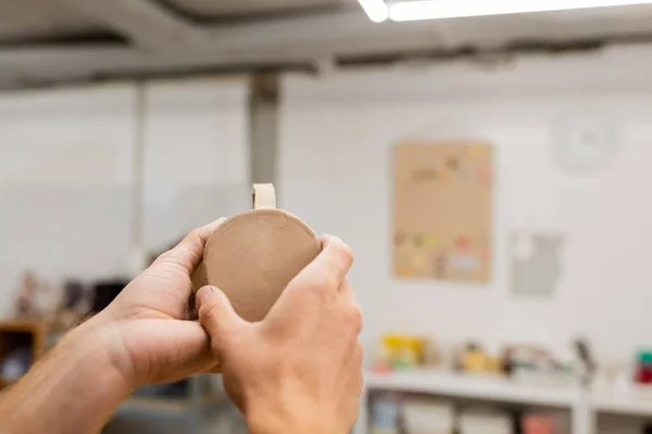 Cropped View Craftsman Holding Clay Cup Blurred Pottery Workshop — Stock Photo, Image