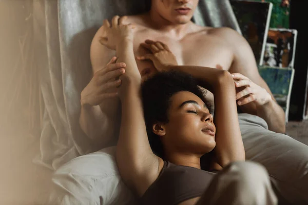 Passionate African American Woman Closed Eyes Touching Muscular Shirtless Man — Stock Photo, Image