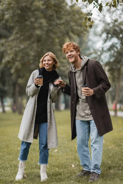Full Length Positive Man Paper Cup Holding Hands Pleased Girlfriend — Stock Photo, Image