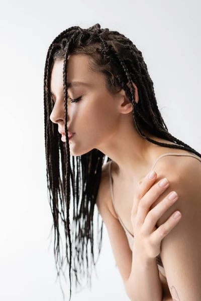 Young Brunette Woman Braids Touching Shoulder Isolated Grey — ストック写真
