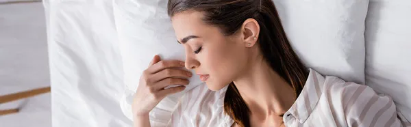 Top view of young woman sleeping in bed, banner — Stock Photo