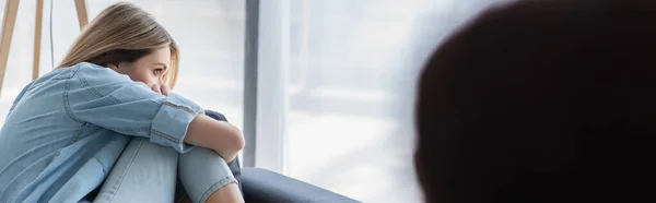 Depressed woman sitting near window during psychological consultation, banner — Stock Photo