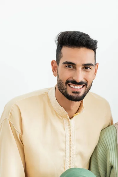 Young muslim man looking at camera at home — Stock Photo