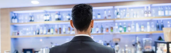 Back view of security man near blurred hotel bar, banner — Stock Photo