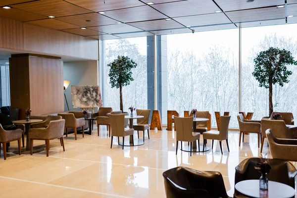 Restaurant in spacious lounge of modern hotel — Stock Photo