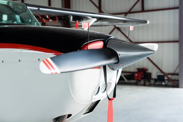 Close up view of modern helicopter with propeller on parking — Stock Photo