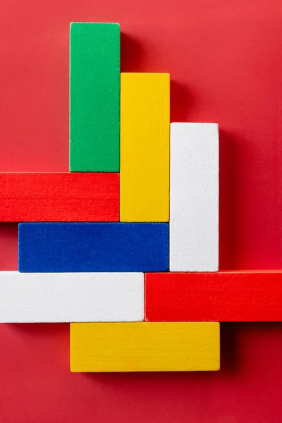 Close up view of red, white, blue, yellow and green blocks on bright background — Stock Photo