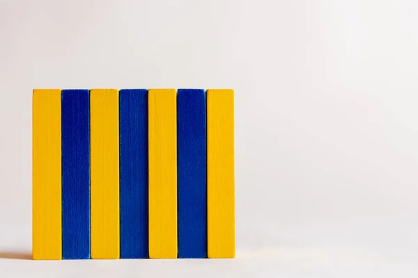 Rectangle made of blue and yellow blocks on white background, ukrainian concept — Stock Photo