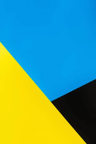 Fondo abstracto azul, amarillo y negro con espacio de copia - foto de stock