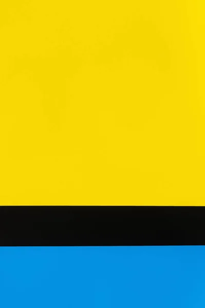 Geometric blue, black and yellow background with copy space — Stock Photo