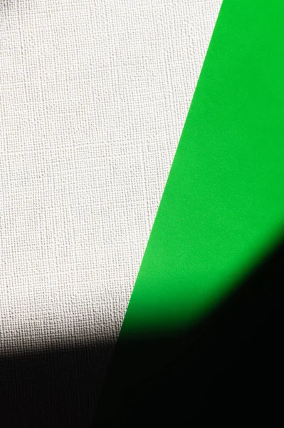 Verde e branco texturizado fundo com sombra preta — Fotografia de Stock