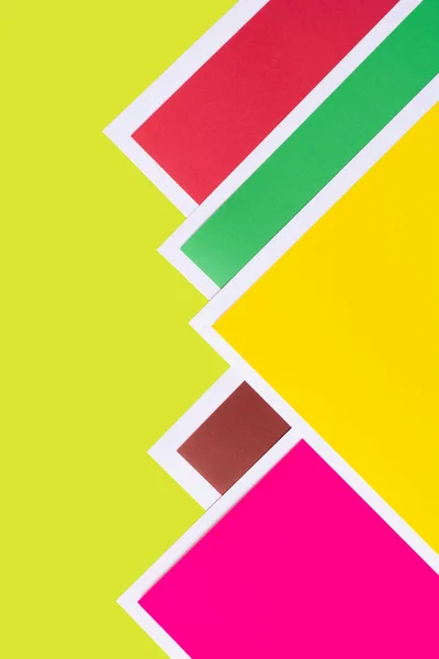 Bright geometric background with multicolored paper corners — Stock Photo