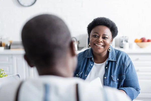 Happy senior african american woman looking at husband — Stock Photo