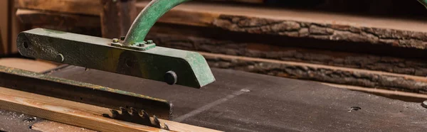 Workbench with circular saw in carpentry workshop, banner — Stock Photo