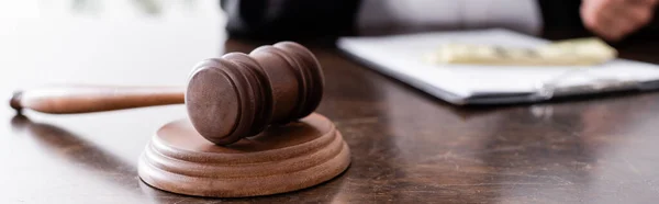 Close up view of wooden judge gavel on desk, banner — Stockfoto