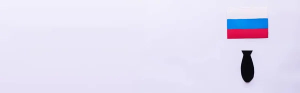 Top view of russian flag and paper bomb on white background, banner — Stock Photo