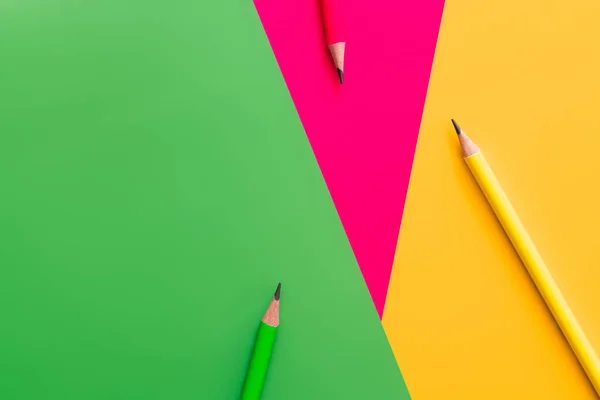 Top view of pencils on multicolored background — Stock Photo