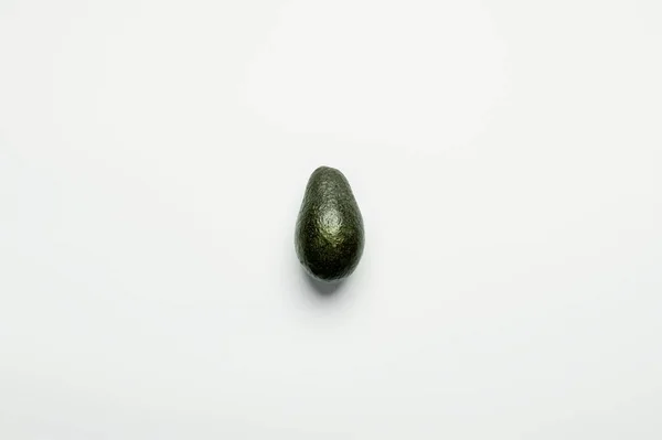 Top view of organic avocado on white background — Stock Photo