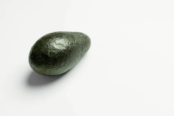 Ripe green avocado on white background — Stock Photo