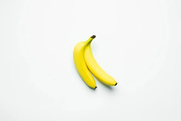 Top view of fresh bananas on white background — Stock Photo