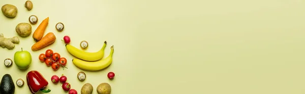 Flat lay with fruits and vegetables on yellow background, banner — Stock Photo