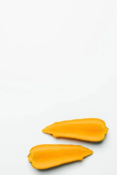 Top view of cut fresh carrot on white background with copy space — Stock Photo