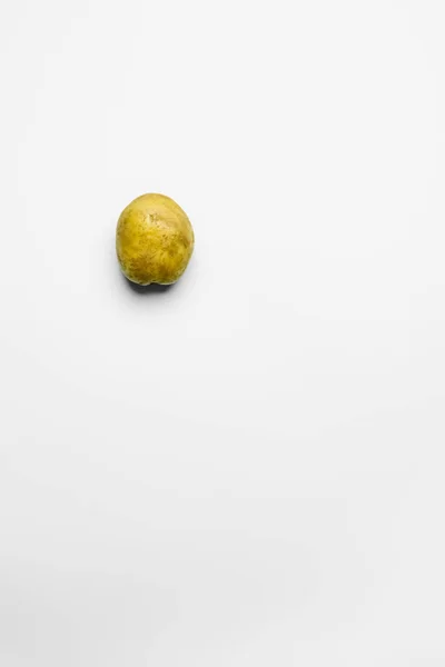 Top view of whole potato on white background with copy space — Foto stock