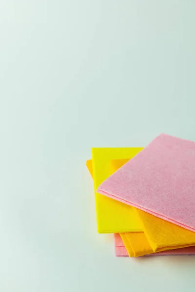 Bright multicolored fabric napkins on grey background with copy space — Foto stock