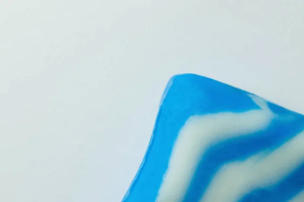 Close up view of blue and white soap bar isolated on grey, top view — Stock Photo