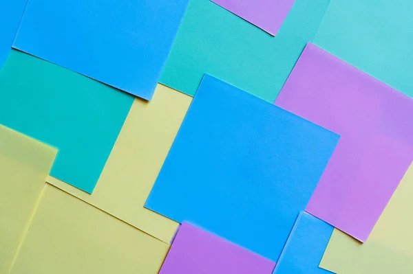 Top view of background with multicolored sticky notes — Stock Photo