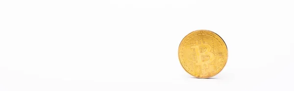 KYIV, UKRAINE - 26 AVRIL 2022 : Pièce de monnaie cryptographique dorée sur fond blanc, bannière — Photo de stock