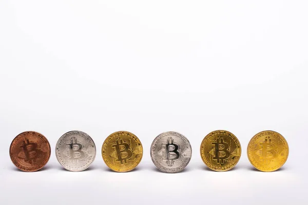 KYIV, UKRAINE - APRIL 26, 2022: Different cryptocurrency on white background — Stock Photo