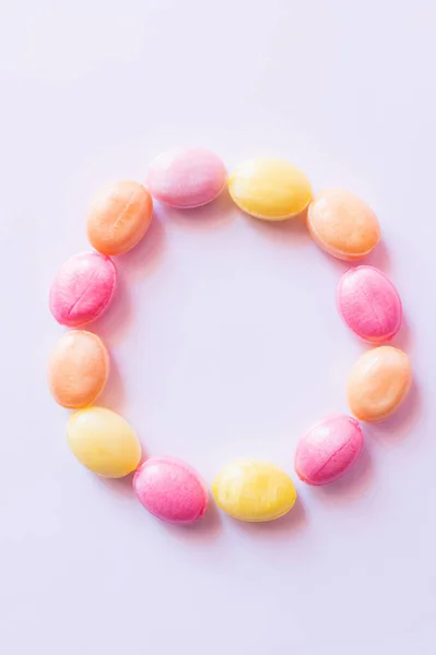 Top view of frame from candies on white background — Stock Photo