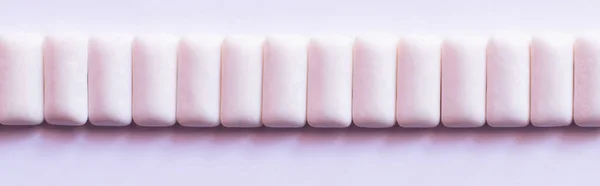 Flat lay of chewing gums on white background, banner — Stock Photo