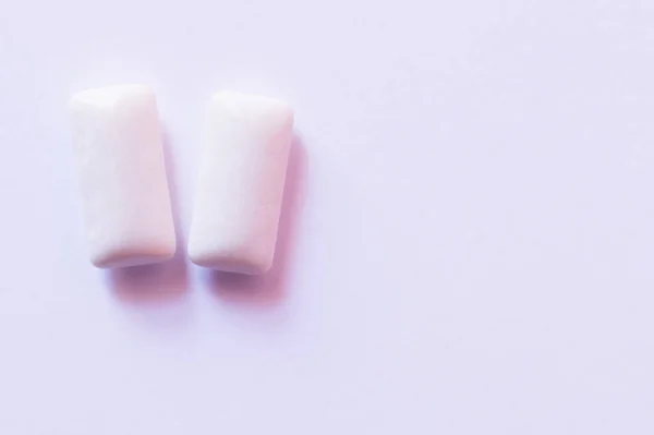 Close up view of chewing gums on white background — Stock Photo