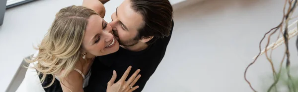 Overhead view of smiling woman dancing with elegant boyfriend in restaurant, banner — Stock Photo