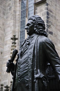 part of statue of Johann Sebastian Bach in Leipzig beside the Thomaskirche