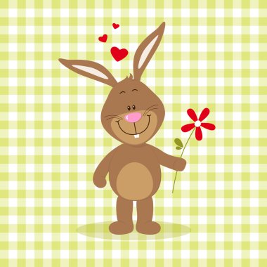 Kırmızı çiçekli küçük tavşan