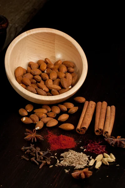 Almond and mix of the spices — Stock Photo, Image