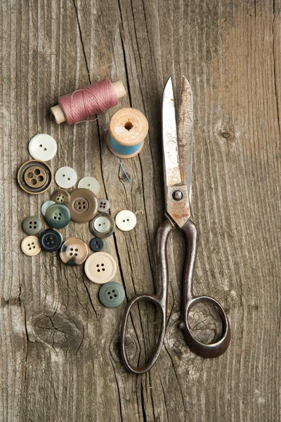 Scissors and buttons — Stock Photo, Image