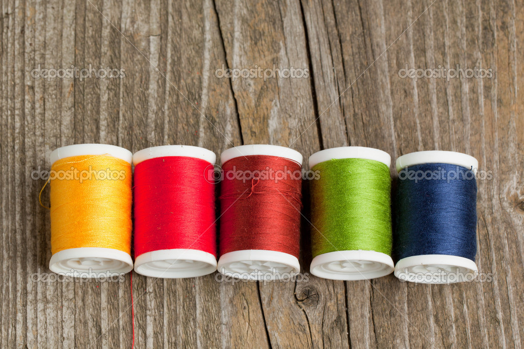 Spools of colorful threads Stock Photo by ©NatashaBreen 20036127