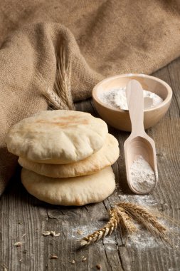 Pita bread with flour clipart