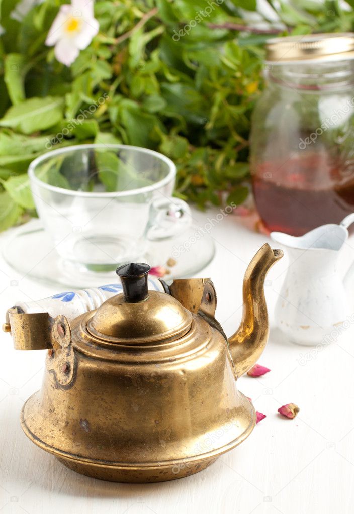 Old golden teapot