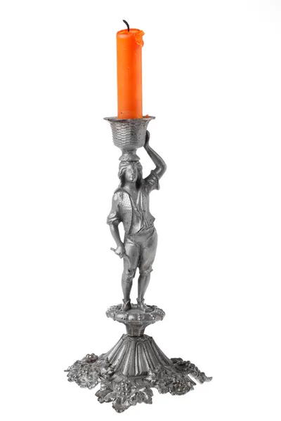 Silver candlestick with orange candle isolated — Stock Photo, Image