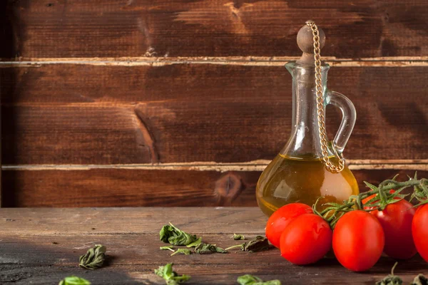 Herb, oil and tomatoes — Stock Photo, Image